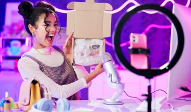 Unboxing, influencer and girl live streaming by phone and ring light for product review, sponsorship or designer brand.