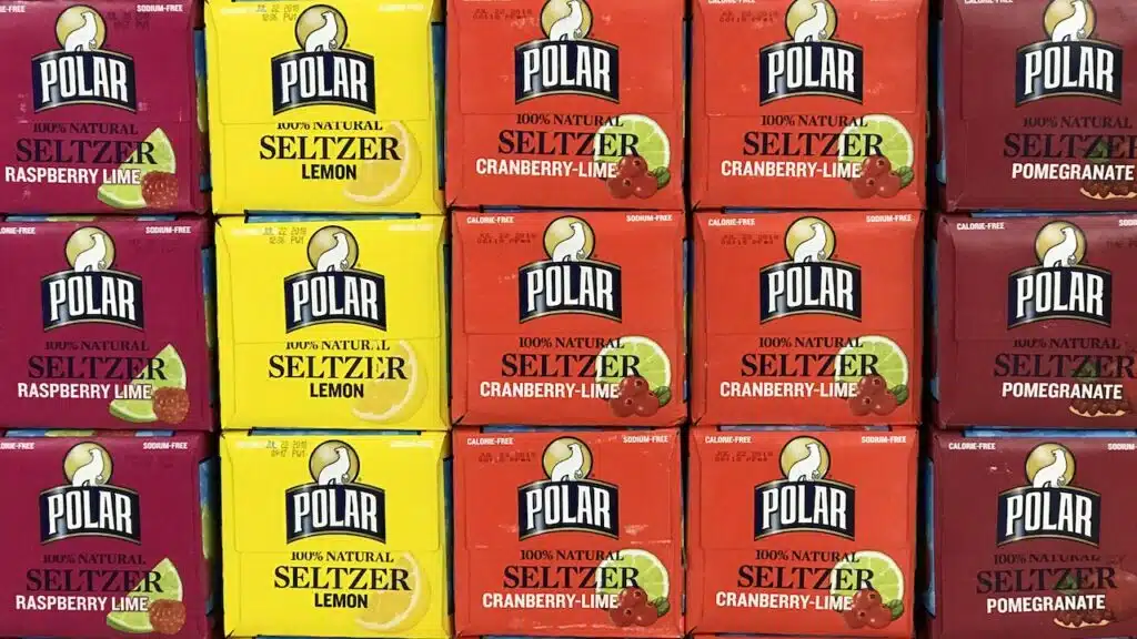 Several cases of Polar sparkling water on a Grocery Shelf