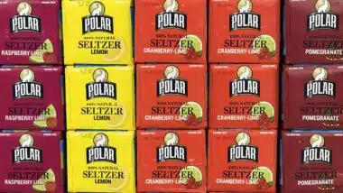 Several cases of Polar sparkling water on a Grocery Shelf
