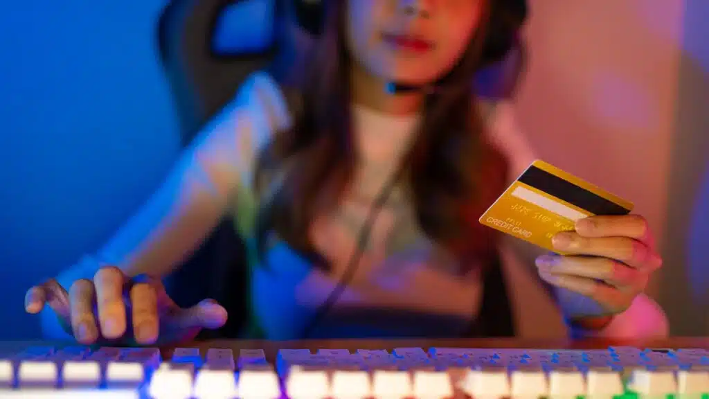 Top up online game with credit card concept.