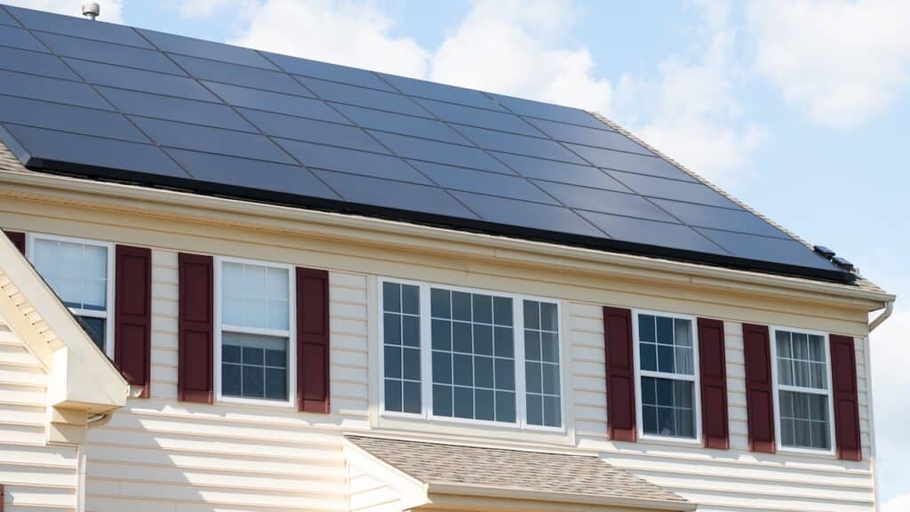 modern houses with solar panels on the roof for alternative energy technology power modern ecology new