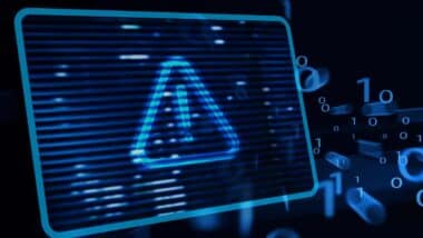 Close up of warning symbol overlay, representing the Belk data breach class action.