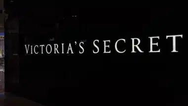 Neon sign of 'Victoria's Secret' at a tenant booth wall in deli park mall