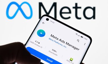 Meta Ads Manager app in app store with Meta logo in the background