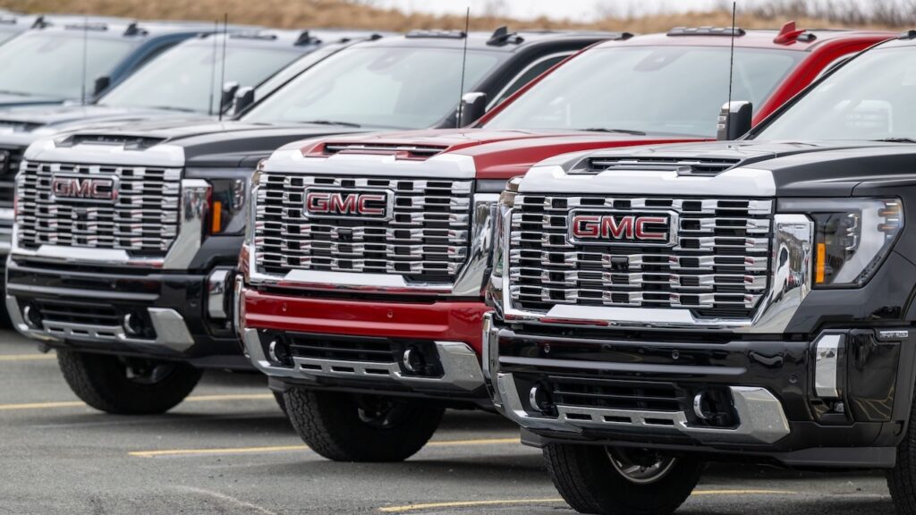 A row of luxury new General Motors Corporation Sierra trucks
