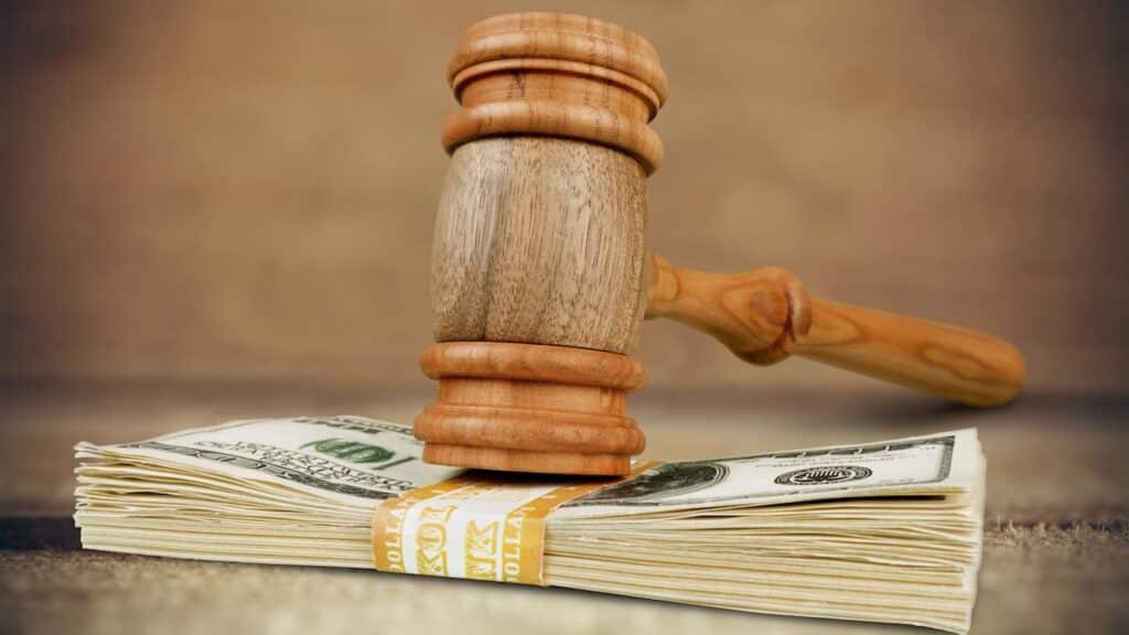 gavel on stack of money