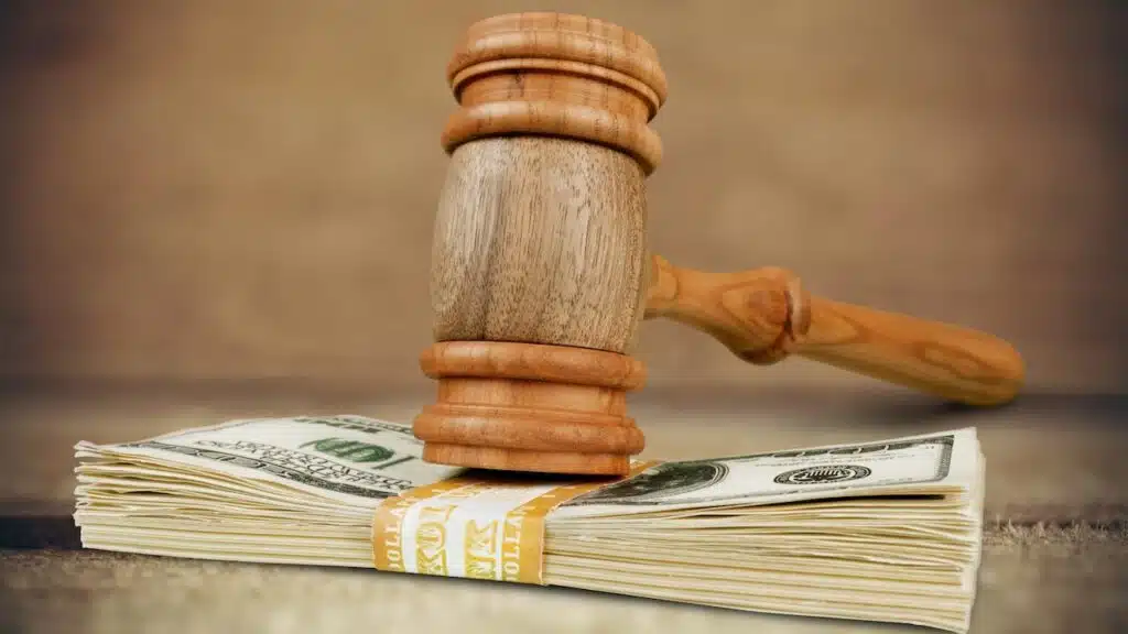 gavel on stack of money