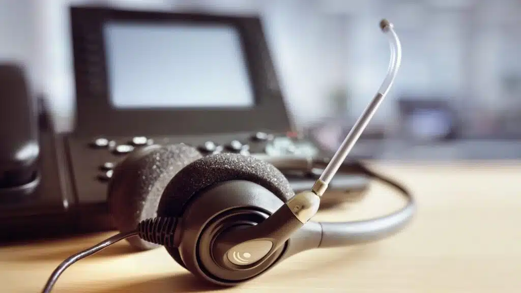 VOIP headset headphones and telephone concept for communication, it support, call center and customer service help desk