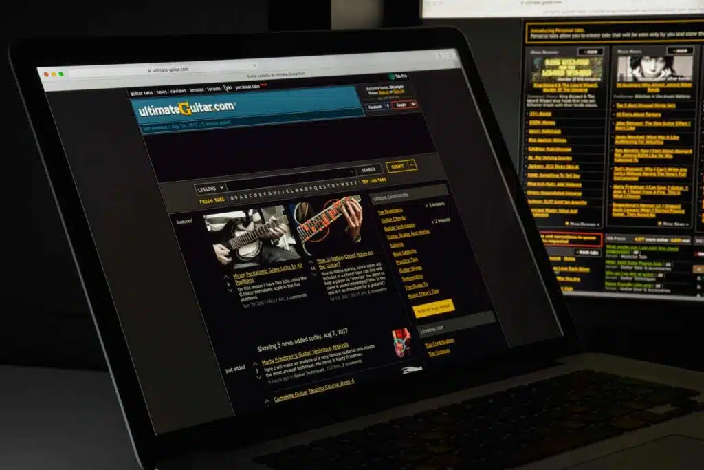 Close up of Ultimate Guitar website on a laptop, representing the Ultimate Guitar class action lawsuit.