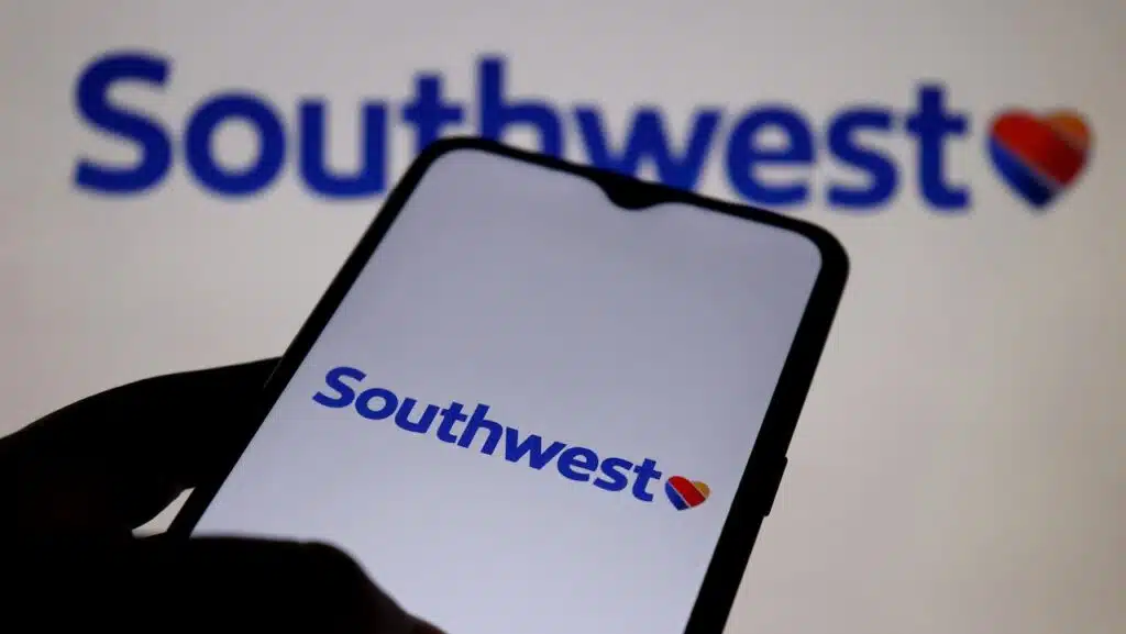 Southwest Airlines logo on smartphone screen. Southwest is one of the major airlines of the United States and the world's largest low-cost carrier airline.
