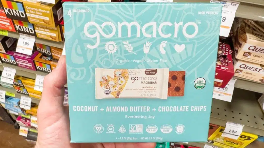 Four pack of GoMacro organic energy bars with coconut, almond butter and chocolate chips.