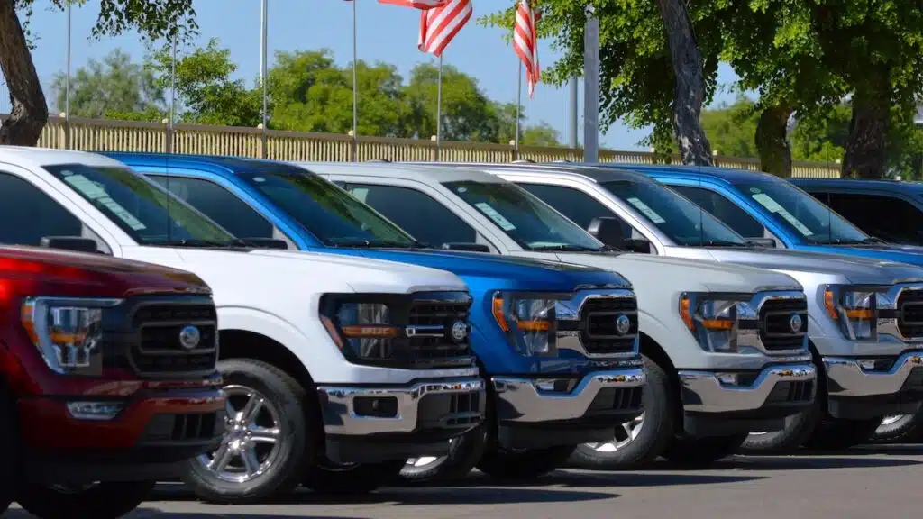A row of new Ford F-150 trucks for sale at a Phoenix area new car dealership.