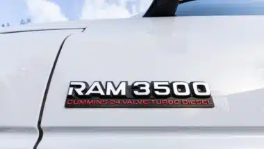 White Dodge Ram 3500 Cummins 24 Valve Turbo Diesel 4x4 off-road American pickup truck emblem logo