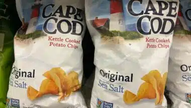 Bags of Cape Code Original sea salt flavored kettle cooked potato chips on display on a store shelf