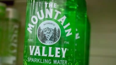 A closeup view of several bottles of Mountain Valley Spring Water