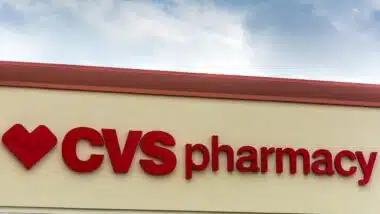 CVS Pharmacy store sign on a cloudy day