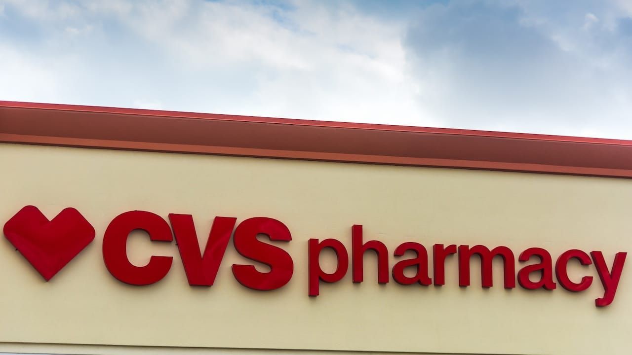 CVS Pharmacy store sign on a cloudy day