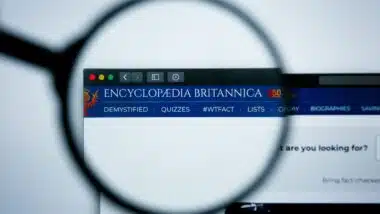 Illustrative Editorial of encyclopaedia britannica website homepage. encyclopaedia britannica logo visible on display screen.