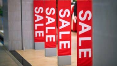 Sale sign at the entrance to clothing store