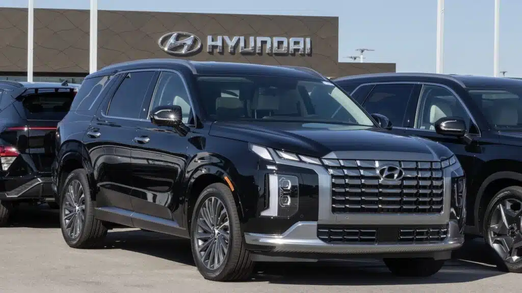 Hyundai Palisade Calligraphy display at a dealership. Hyundai offers the Palisade in SE, SEL, Limited and XRT models