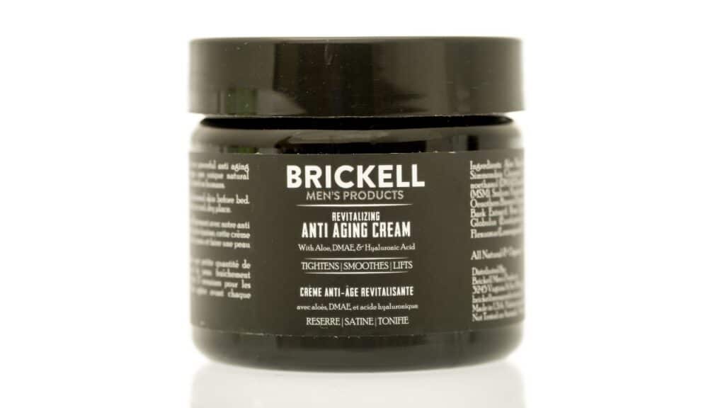 A jar of Brickell anti aging cream on an isolated background. See less