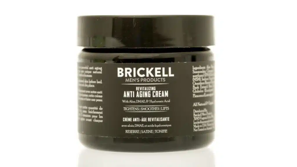 A jar of Brickell anti aging cream on an isolated background. See less