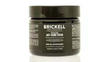 A jar of Brickell anti aging cream on an isolated background. See less