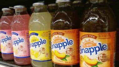 Assorted of Snapple drink bottles display in the supermarket shelves.