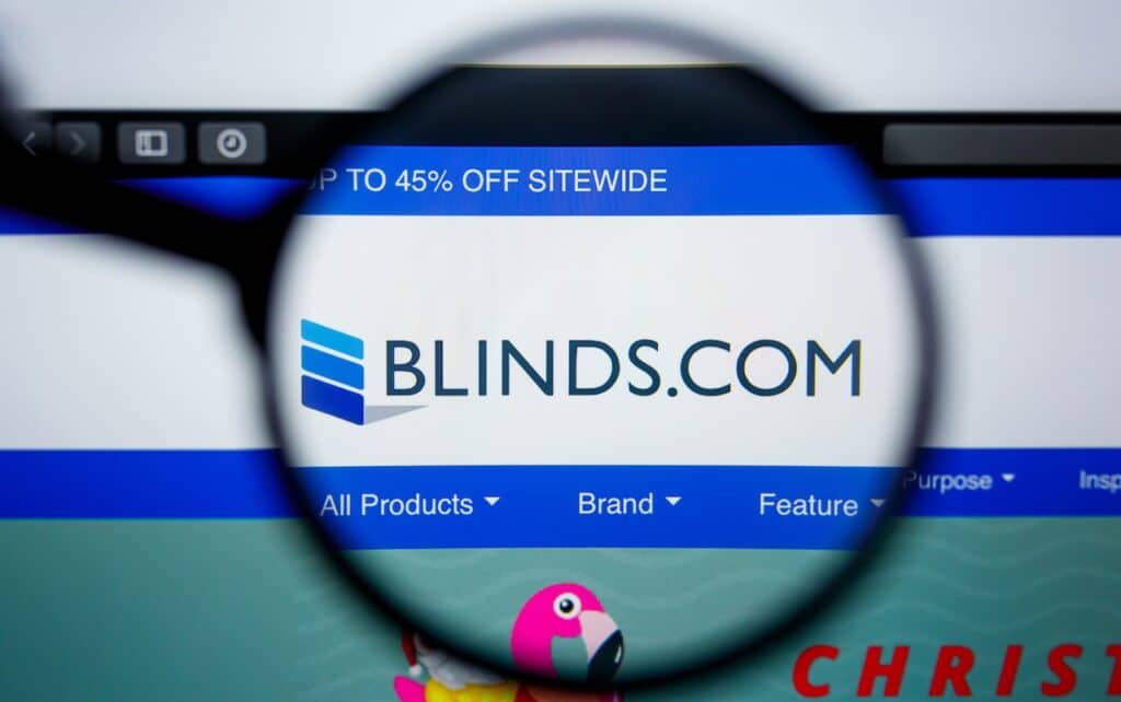 Illustrative Editorial of BLINDS.COM website homepage. BLINDS logo visible on display screen.