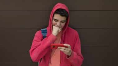 desperate young man with mobile phone