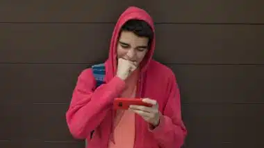 desperate young man with mobile phone