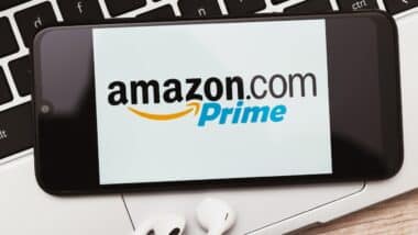 Amazon Prime sign on the smartphone screen. Amazon Prime is a paid subscription service
