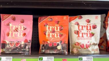 A view of several packages of Tru Fru chocolate dipped fruit, on display at a local grocery store.