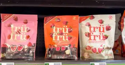 A view of several packages of Tru Fru chocolate dipped fruit, on display at a local grocery store.