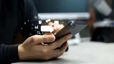 close up on man hand using smartphone