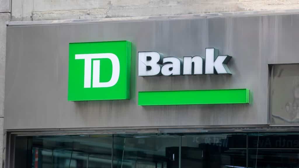 This photograph features the exterior signage of a TD Bank branch in New York City.