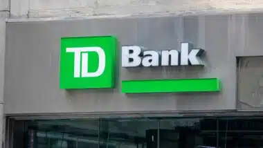This photograph features the exterior signage of a TD Bank branch in New York City.
