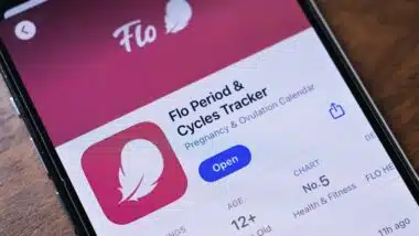 Close-up of a smartphone displaying the Flo app