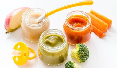 Vegetable and fruits puree for feed babies on white background