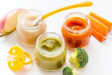 Vegetable and fruits puree for feed babies on white background