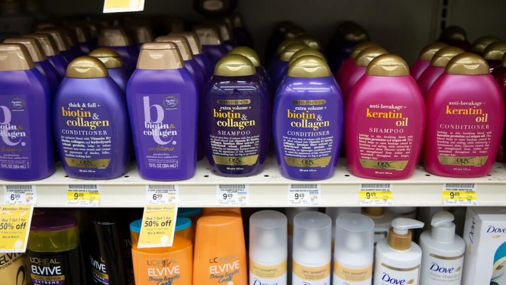 A view of several bottles of OGX hair products, on display at a local grocery store.