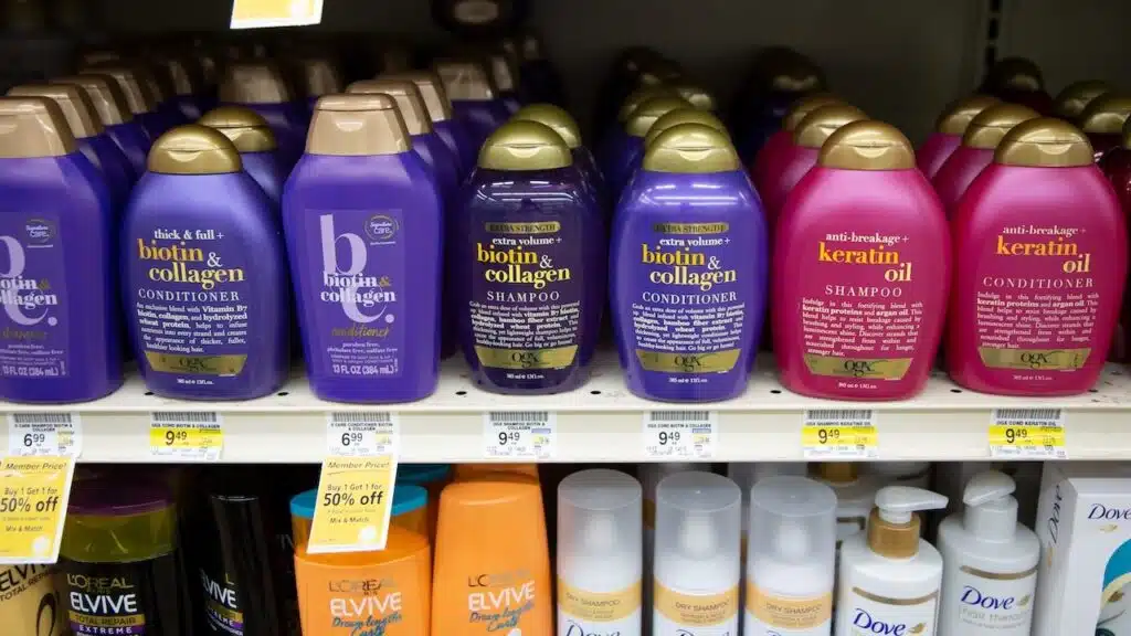 A view of several bottles of OGX hair products, on display at a local grocery store.