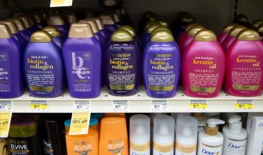 A view of several bottles of OGX hair products, on display at a local grocery store.