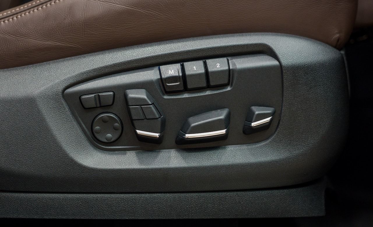 Seat adjustment control unit in a new luxury car.