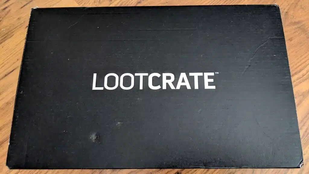 Unopened LootCrate Box on wood floor.