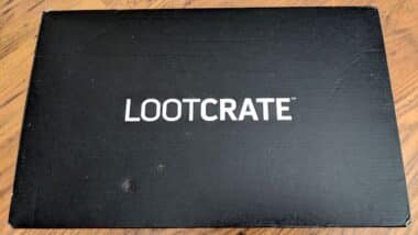 Unopened LootCrate Box on wood floor.