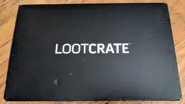 Unopened LootCrate Box on wood floor.