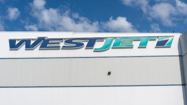 Close up of WestJet sign on the building at its World Headquarters in Calgary, Alberta, Canada
