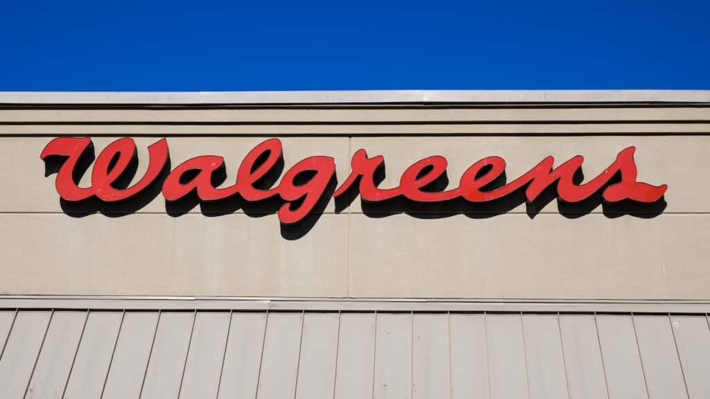 Red script logo sign on Walgreens store in closeup