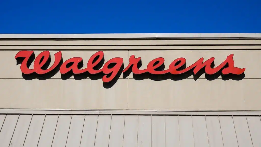 Red script logo sign on Walgreens store in closeup